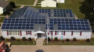 House with solar panels on roof.