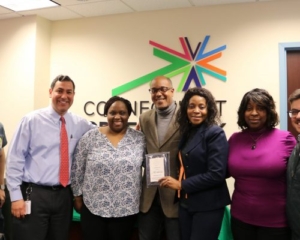 Photo of Home Comfort Practice staff receiving award