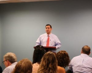 Connecticut Green Bank President and CEO Bryan Garcia addresses the group.