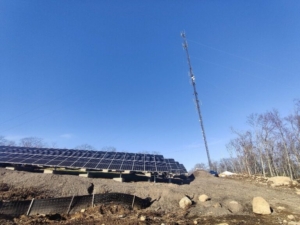 Photo of the Communications Tower and solar panel array in Bolton