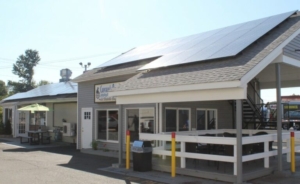 Photo of Westville Seafood in New Haven, CT and its 88 370 watt panel rooftop solar array.