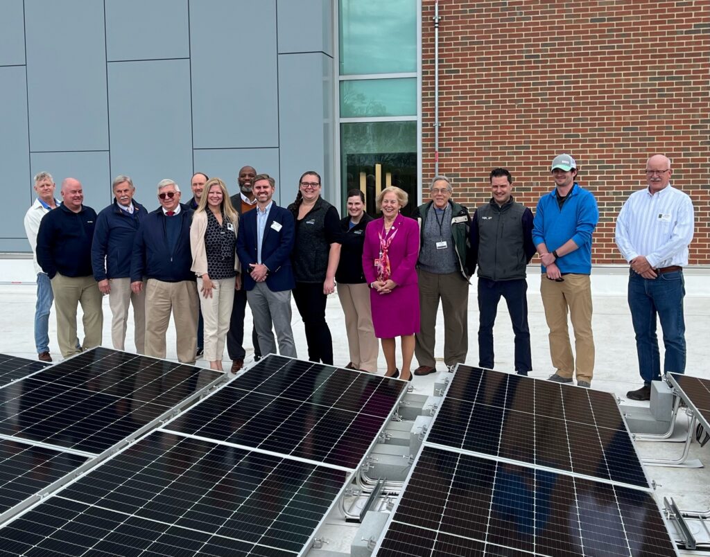 Ribbon-cutting ceremony celebrating solar installations at Groton Public Schools.