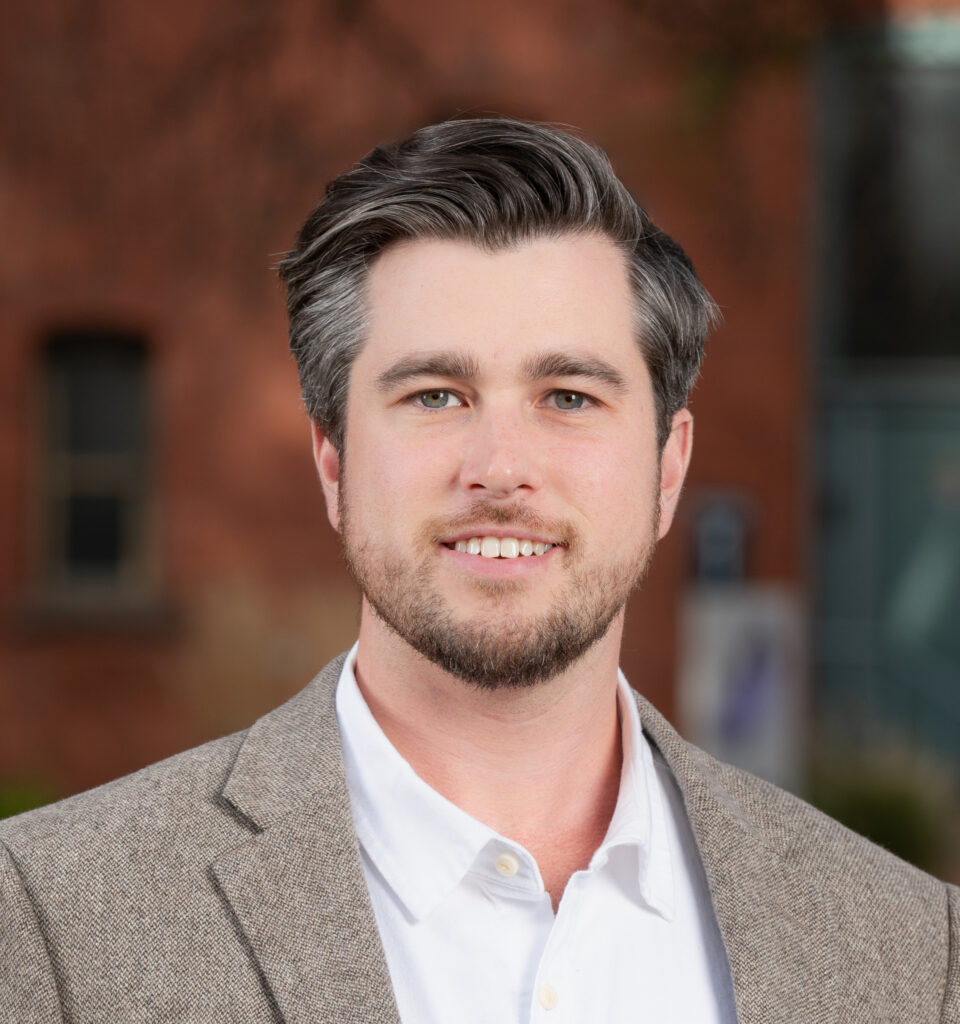 Austin Dziki, Associate Director